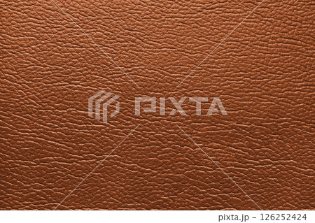 Glossy structure of genuine leather, natural orange colored skin surface, leatharette texture Glossy structure of genuine leather, natural orange colored skin surface, leatharette texture 126252424
