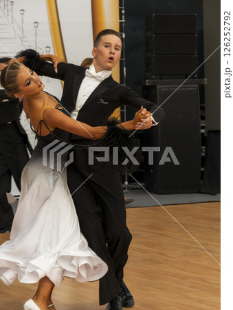 couple dancing standard European program on the dance floor couple dancing standard European program on the dance floor 126252792