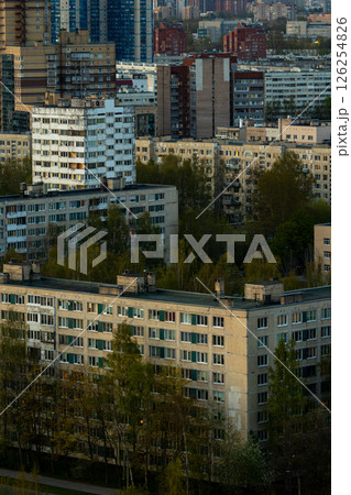 urban landscape with tall buildings and several trees, residential area, multi-storey buildings. 126254826