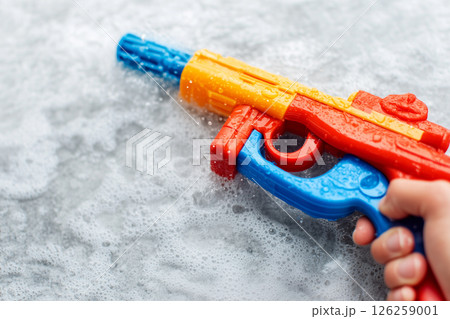 Colorful Water Gun Ready for Fun During Songkran Festival Celebrations in Thailand Colorful Water Gun Ready for Fun During Songkran Festival Celebrations in Thailand 126259001