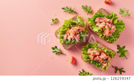 Sandwich bread with tuna, tomato, and lettuce for simple food, copy space flat lay 126259347