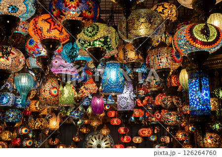 Lamps, Turkey, Bazaar: Colorful mosaic glass lamps illuminate a bustling Turkish bazaar, showcasing vibrant handcrafted artistry. 126264760