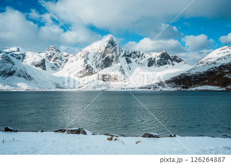 Lofoten winter landscape with fjord and snowy peaks Lofoten winter landscape with fjord and snowy peaks 126264887