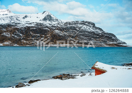 Lofoten winter landscape with fjord and snowy peaks Lofoten winter landscape with fjord and snowy peaks 126264888