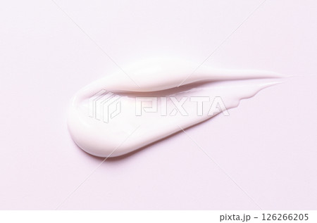 A sample of white cosmetic body moisturizer 126266205