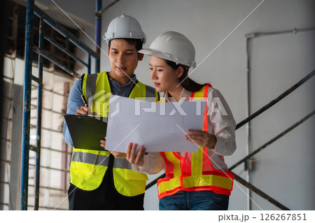 Construction engineers discussion with architects at construction site or building site Construction engineers discussion with architects at construction site or building site 126267851