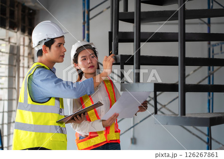 Construction engineers discussion with architects at construction site or building site Construction engineers discussion with architects at construction site or building site 126267861