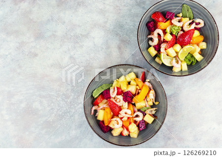 Fresh shrimp salad with colorful fruits. 126269210