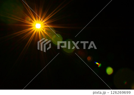 Sun flare on the black background Sun flare on the black background 126269699