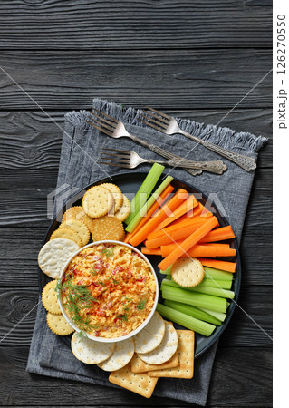 pimento cheese dip served with crackers, veggies pimento cheese dip served with crackers, veggies 126270550