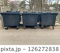 Separate plastic mobile garbage containers for general waste collection 126272838
