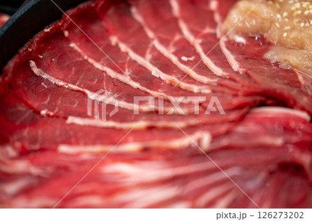 Close up of sliced raw meat. prepared for cooking Close up of sliced raw meat. prepared for cooking 126273202