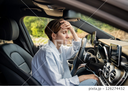 Tired woman stopped after driving car, thinking about life troubles, has panic attack. Burnout 126274432