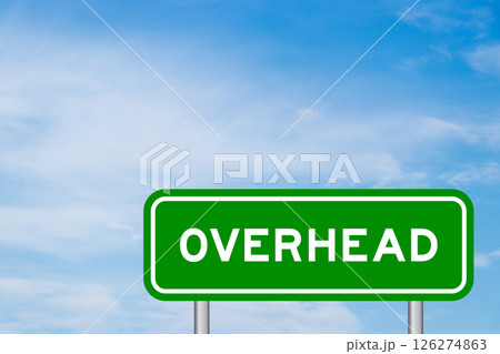 Green color transportation sign with word overhead on blue sky with white cloud background 126274863