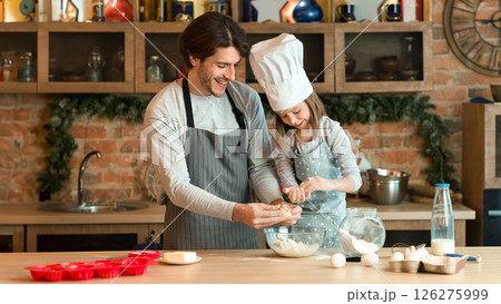 Little Chef. Cute Girl Baking With Father In Kitchen, Preparing Pastry Together, Wearing White Cooking Hat And Smiling, Copy Space 126275999