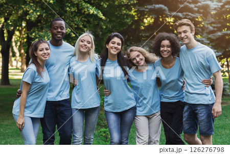 Group of happy young diverse volunteers embracing at park, ready for work, copy space Group of happy young diverse volunteers embracing at park, ready for work, copy space 126276798