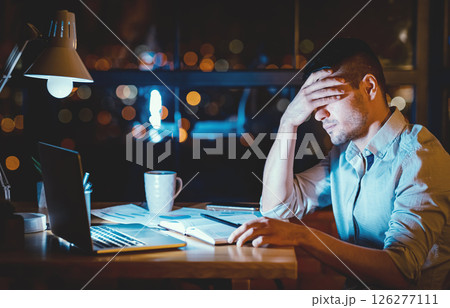 Overworked Office Guy At Laptop Covering Eyes Sitting At Workplace At Night. Exhausting Job. Free Space 126277111