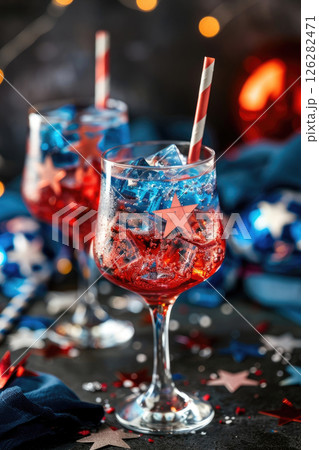 Elegant glasses with patriotic berry cocktail decorated with US flag stars for Independence Day celebration, vertical banner 126282471