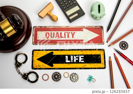 Quality of Life. Red and yellow directional arrow with text Quality of Life. Red and yellow directional arrow with text 126283837