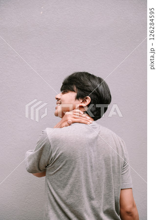 young asian man suffering from pain 126284595