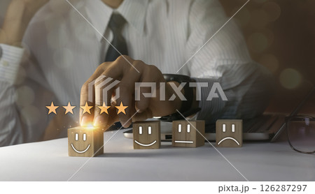 User give rating to service experience on online application for Customer review satisfaction feedback survey concept. User give rating to service experience on online application for Customer review satisfaction feedback survey concept. 126287297