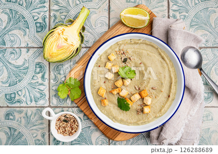 Artichoke cream soup 126288689
