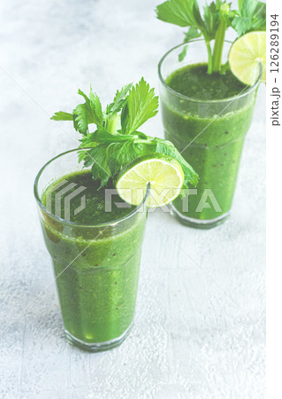 two glasses, with green smoothie, celery and spinach, apple and kiwi, cucumber, vegetable smoothie, breakfast, homemade, no people, two glasses, with green smoothie, celery and spinach, apple and kiwi, cucumber, vegetable smoothie, breakfast, homemade, no people, 126289194