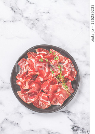 plate with sliced cured meat, pork neck, prosciutto coppa, Italian delicacy, plate with sliced cured meat, pork neck, prosciutto coppa, Italian delicacy, 126289235