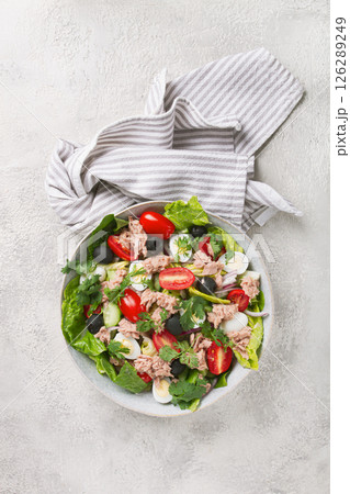 salad with canned tuna, vegetable salad with quail eggs, lettuce and romaine leaves, red onion, cherry tomatoes, olives, keto food, healthy eating, salad with canned tuna, vegetable salad with quail eggs, lettuce and romaine leaves, red onion, cherry tomatoes, olives, keto food, healthy eating, 126289249