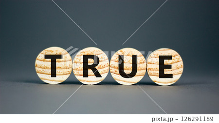True symbol. Concept word True on beautiful wooden circles. Beautiful grey table grey background. Business, lifestyle, support and true concept. Copy space. True symbol. Concept word True on beautiful wooden circles. Beautiful grey table grey background. Business, lifestyle, support and true concept. Copy space. 126291189