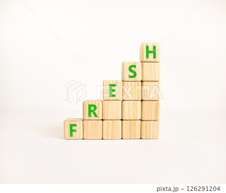 Fresh symbol. Concept word Fresh on beautiful wooden blocks. Beautiful white table white background. Business lifestyle fresh concept. Copy space. Fresh symbol. Concept word Fresh on beautiful wooden blocks. Beautiful white table white background. Business lifestyle fresh concept. Copy space. 126291204