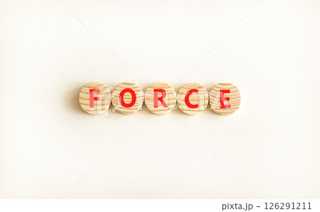 Force symbol. Concept word Force on beautiful wooden circles. Beautiful white table white background. Business lifestyle force concept. Copy space. Force symbol. Concept word Force on beautiful wooden circles. Beautiful white table white background. Business lifestyle force concept. Copy space. 126291211