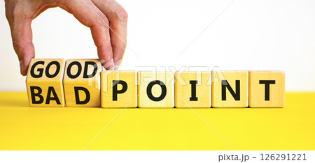 Good or bad point symbol. Concept words Good point Bad point on beautiful wooden blocks. Beautiful yellow table white background. Businessman hand. Business good bad point concept. Copy space 126291221