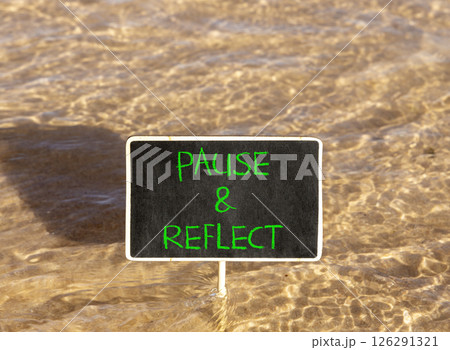 Pause and reflect symbol. Concept words Pause and reflect on beautiful blackboard. Beautiful Red sea water background. Business motivational lifestyle pause and reflect concept. Copy space. Pause and reflect symbol. Concept words Pause and reflect on beautiful blackboard. Beautiful Red sea water background. Business motivational lifestyle pause and reflect concept. Copy space. 126291321