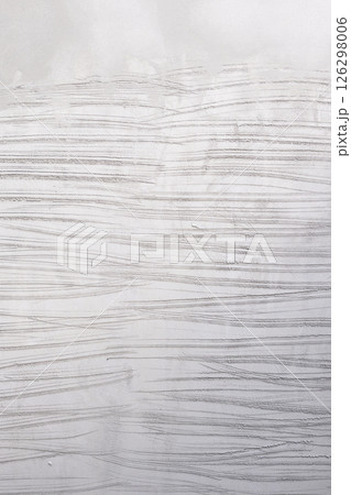 Concrete plastering wall and scrate surface to prepare for tile installation. Concrete plastering wall and scrate surface to prepare for tile installation. 126298006