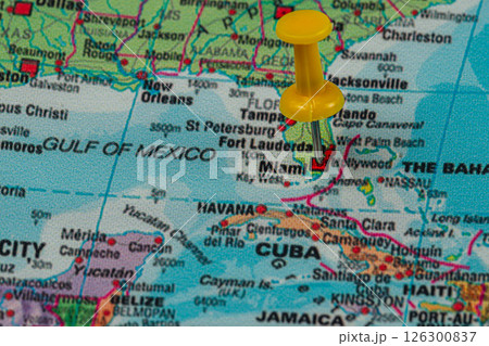 Bright yellow pushpin marks Miami on a detailed map of Florida 126300837