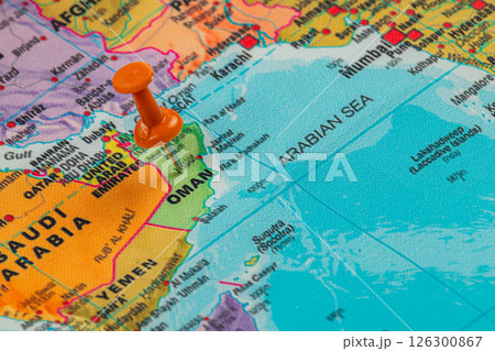 Pinpointing Oman on a vibrant world map in detail 126300867