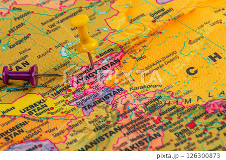 Map highlighting Kyrgyzstan with colorful push pins Map highlighting Kyrgyzstan with colorful push pins 126300873