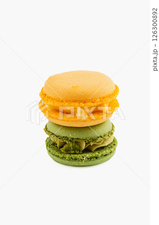 Colorful macarons stacked in a tempting dessert display 126300892