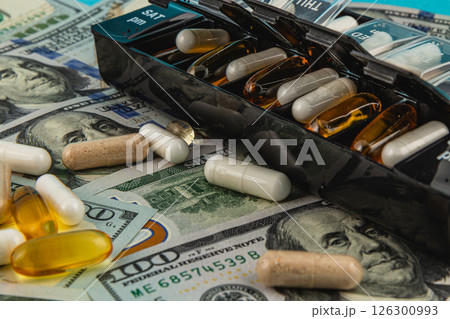 Supplements and cash dollars create a contrasting display Supplements and cash dollars create a contrasting display 126300993