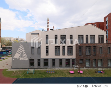 A Modern Building designed with a Nautical Motif beautifully integrated into an Urban Setting 126301060