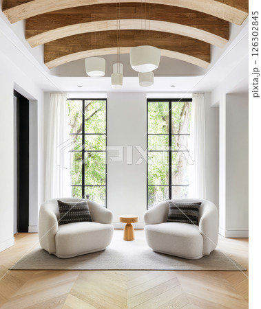 Elegant modern living room with comfortable seating and bright natural light 126302845