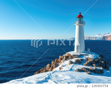 Snowy Coastal Lighthouse on a Winter Day Snowy Coastal Lighthouse on a Winter Day 126303758
