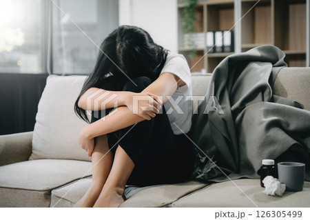 woman sit Depression Dark haired  pensive glance Standing by window and anxiety Copy space. 126305499