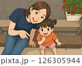 並んで座る母と娘 126305944