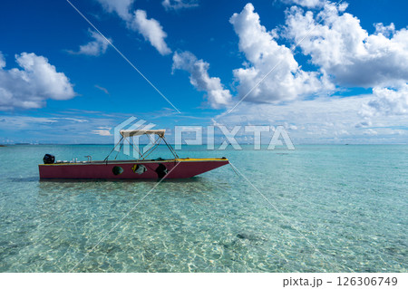 Colorful boat on the lagoon near Motu Pitiahe, Maupiti, French Polynesia Colorful boat on the lagoon near Motu Pitiahe, Maupiti, French Polynesia 126306749