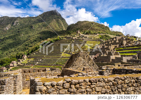 Panoramic view of Machu Picchu ruins with Huayna Picchu in background, Peru 126306777