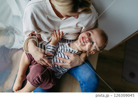 Beautiful mother hugging little son, Beautiful mother hugging little son, 126309045