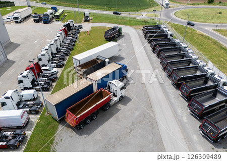 Parking of new and used trucks near the distribution and service center. Aerial view 126309489