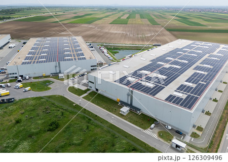 Logistics centers with solar panels on roofs. Aerial view 126309496